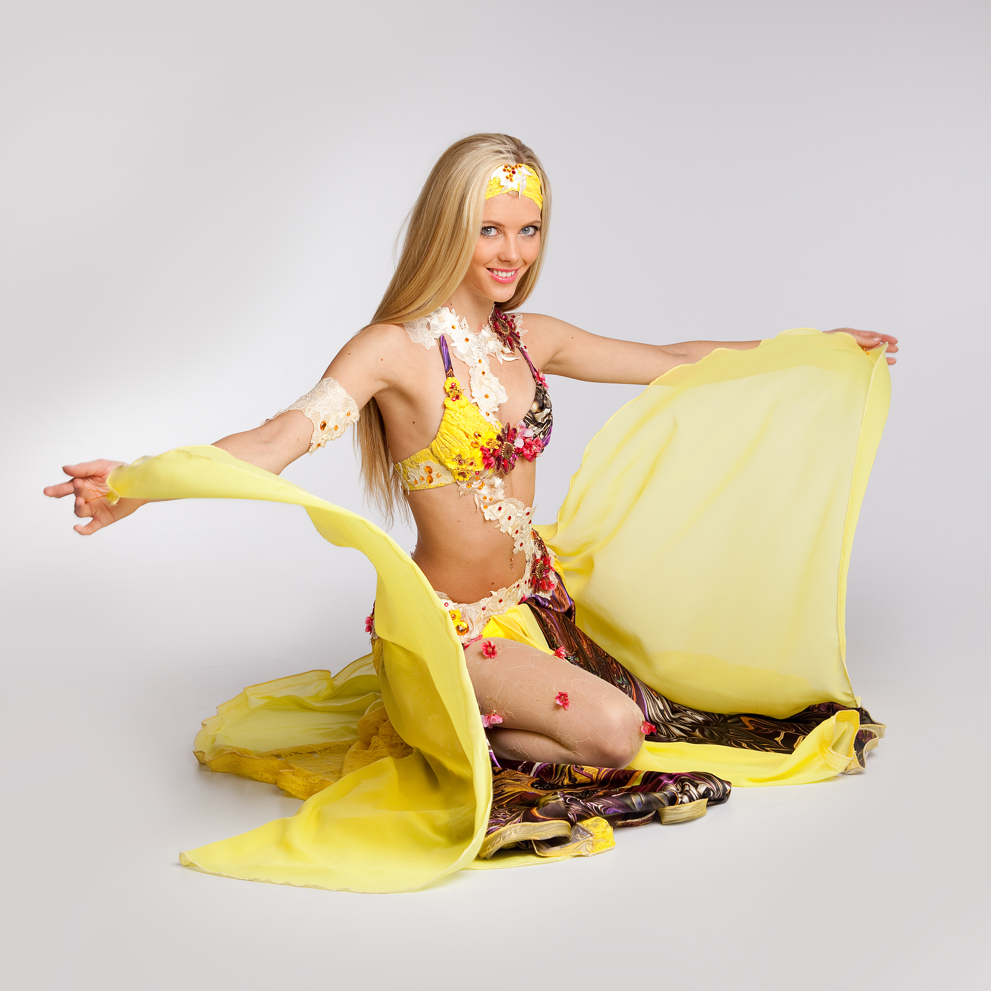 Ines dancing with a flowing yellow veil